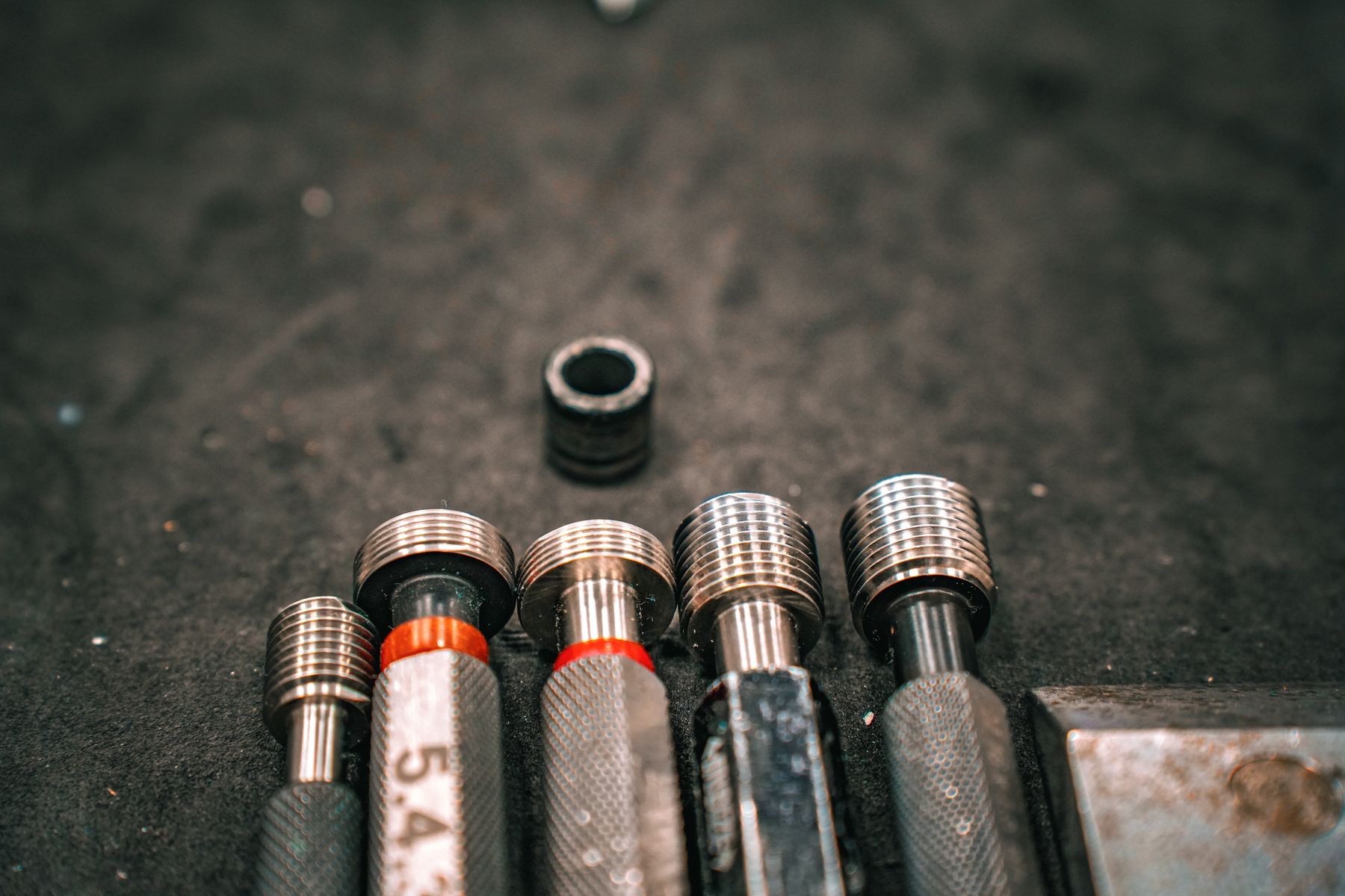 Industrial tools on a dark surface